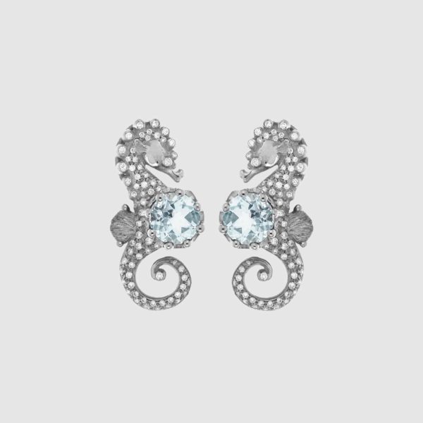 Sea-horses in white Gold