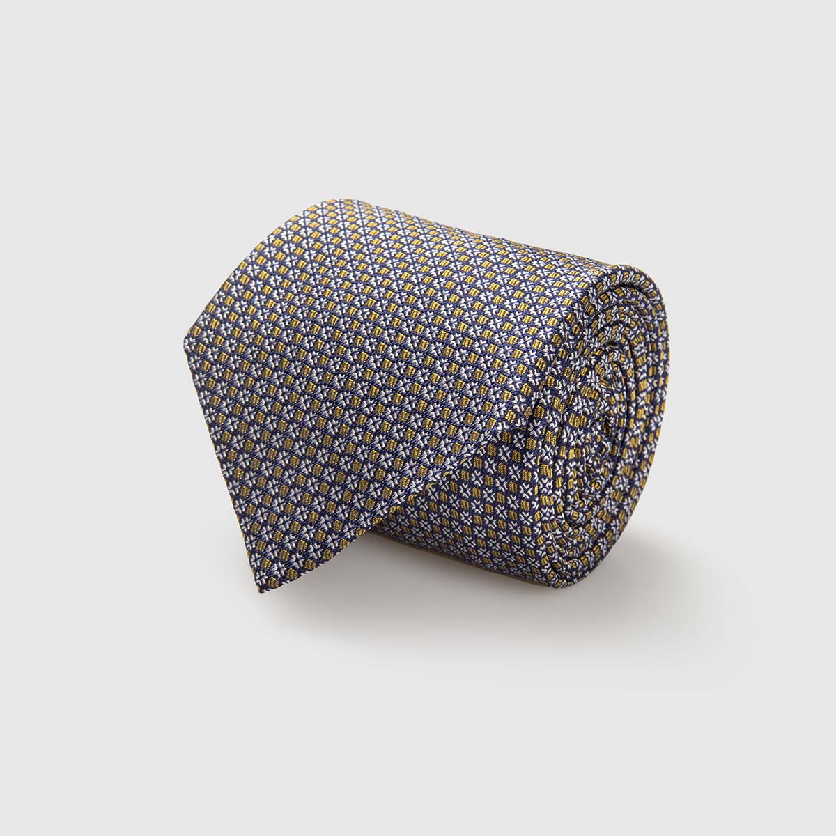 5-Fold Silk Jacquard Tie with geometrical pattern in gold and white