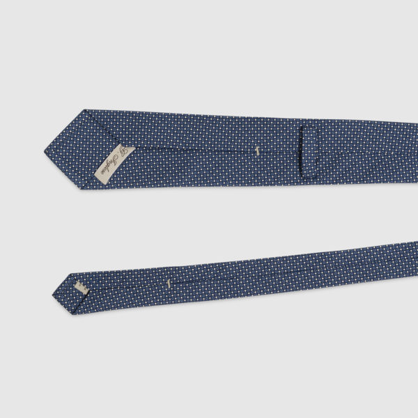 Blue silk tie with white polka dots