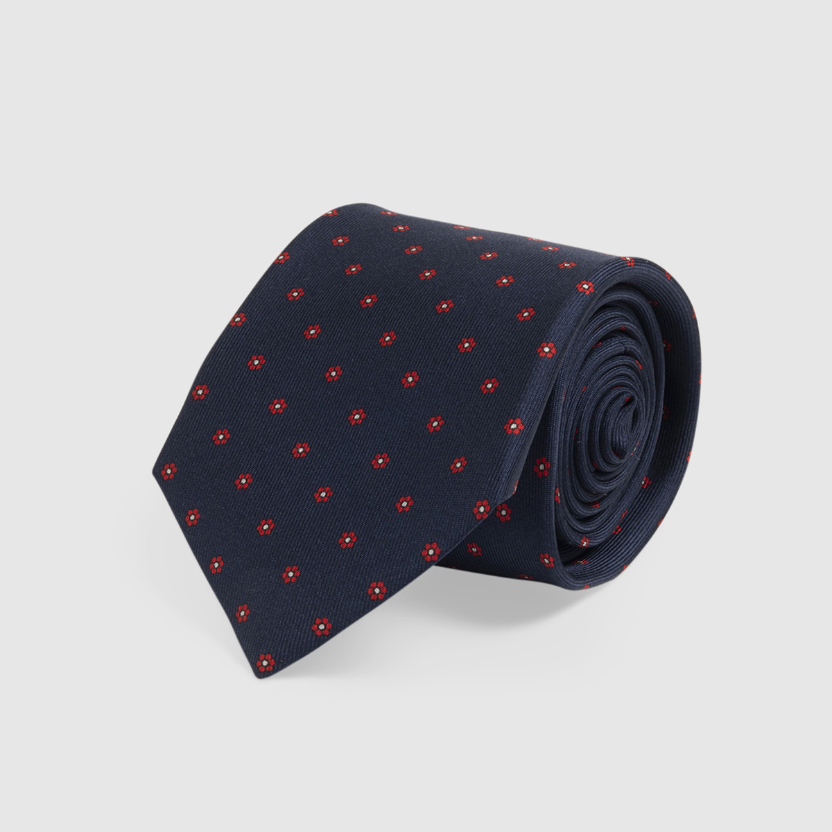 Navy blue silk tie with floral micro-pattern